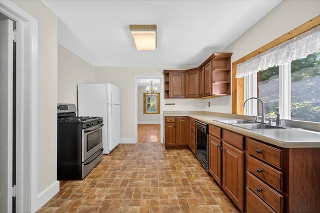 1095 State Route 94, New Windsor, NY 12553 - kitchen with open shelves, stainless steel gas stove, brick floors, light countertops, and dishwasher