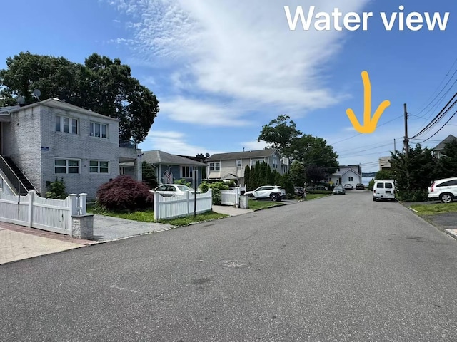 38 Nesaquake Ave, Port Washington, NY 11050 - view of asphalt road featuring a residential view