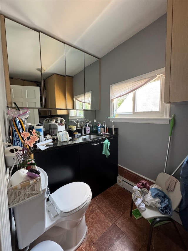 38 Nesaquake Ave, Port Washington, NY 11050 - kitchen with dark countertops and a sink