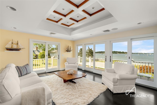 50 Ships Point Ln, Oyster Bay, NY 11771 - living area featuring plenty of natural light, coffered ceiling, wood finished floors, beam ceiling, and a water view