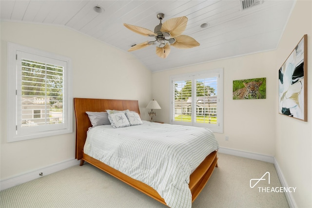50 Ships Point Ln, Oyster Bay, NY 11771 - bedroom with vaulted ceiling, carpet flooring, and ceiling fan