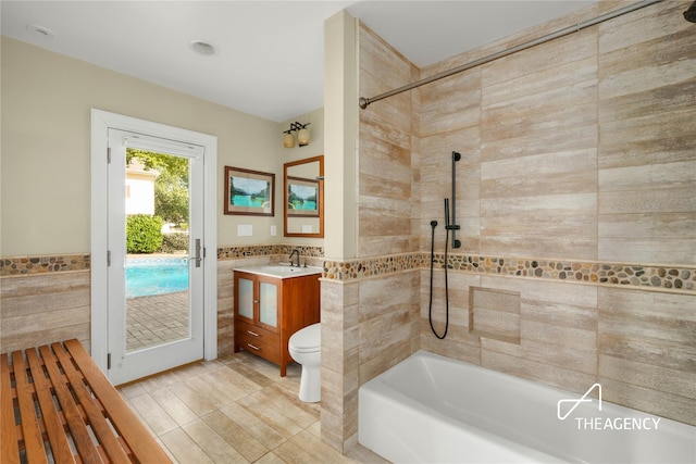 50 Ships Point Ln, Oyster Bay, NY 11771 - bathroom with tile walls, vanity,  shower combination, recessed lighting, and a wainscoted wall