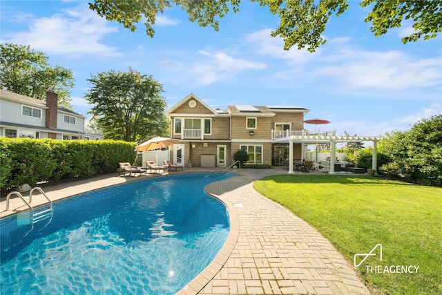 50 Ships Point Ln, Oyster Bay, NY 11771 - view of pool featuring a pergola, a patio area, and a lawn