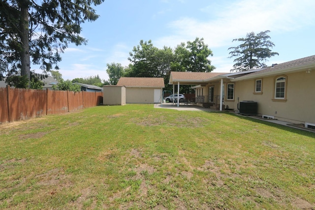 148 Spruce St, Lindenhurst, NY 11757 - view of yard featuring a patio area and a storage unit
