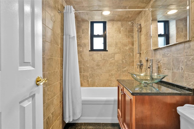 21-40 78th St Unit 2, East Elmhurst, NY 11370 - bathroom with shower / bath combo, tile walls, vanity, and tile patterned floors