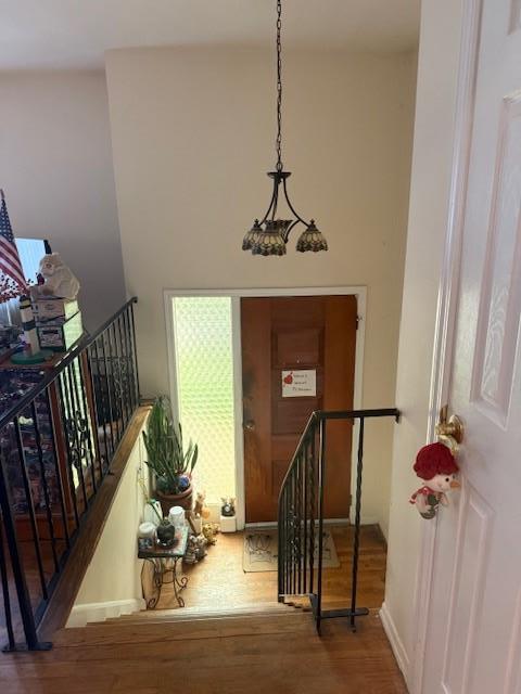 216 Hill Ave, Elmont, NY 11003 - foyer entrance featuring wood finished floors and stairway