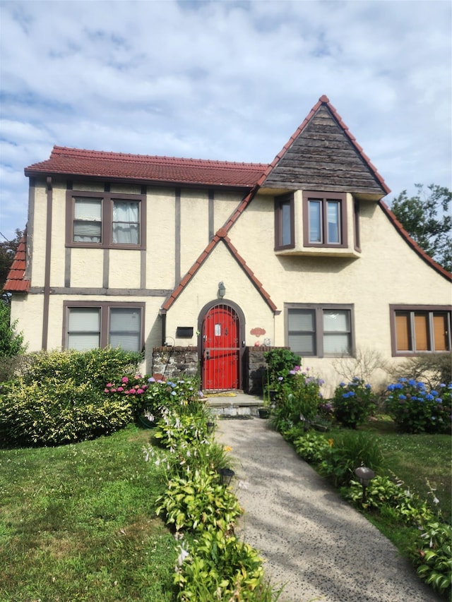 118 Carver Ter, Yonkers, NY 10710 - english style home featuring stucco siding and a tile roof