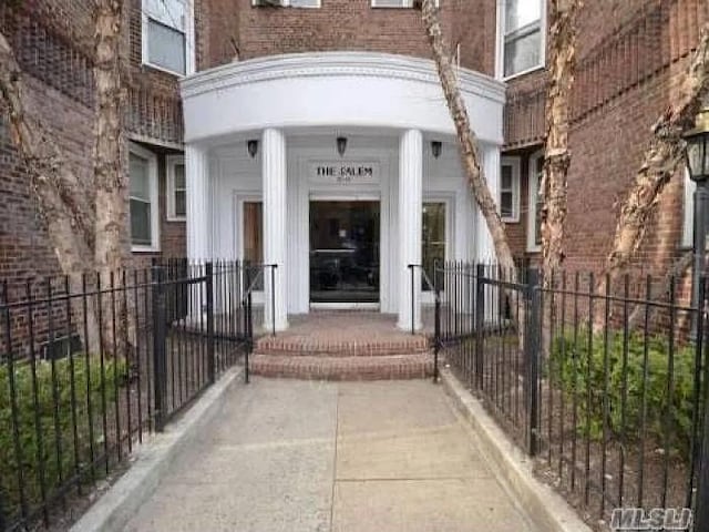 7215 37th Ave Unit 3H, Jackson Heights, NY 11372 - doorway to property featuring brick siding
