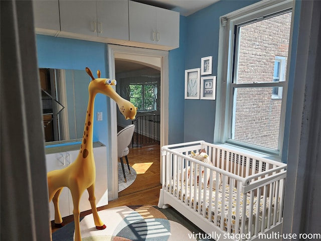 7215 37th Ave Unit 3H, Jackson Heights, NY 11372 - bedroom featuring wood finished floors