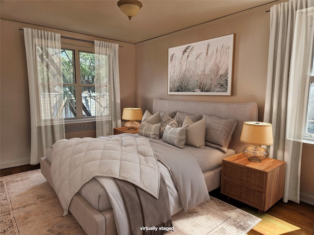 7215 37th Ave Unit 3H, Jackson Heights, NY 11372 - bedroom featuring wood finished floors and baseboards