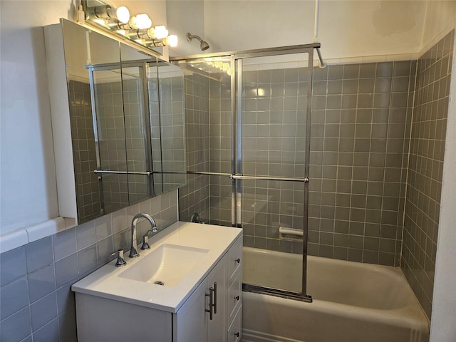 7215 37th Ave Unit 3H, Jackson Heights, NY 11372 - bathroom with vanity, enclosed tub / shower combo, and tile walls