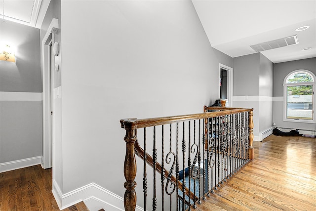 3 Grant Ave, Albertson, NY 11507 - hall featuring an upstairs landing, wood finished floors, attic access, and recessed lighting