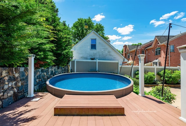 3 Grant Ave, Albertson, NY 11507 - view of swimming pool featuring a deck and an outbuilding