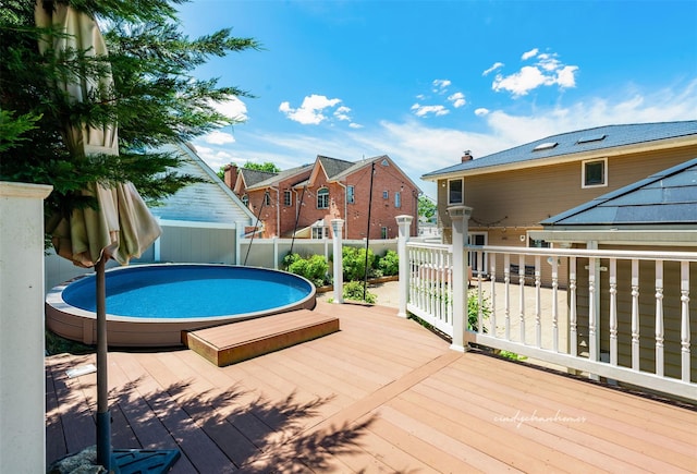 3 Grant Ave, Albertson, NY 11507 - view of swimming pool featuring a jacuzzi and a wooden deck