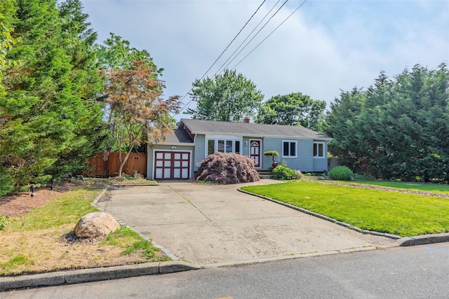 12 Rivera Ln, West Sayville, NY 11796 - view of front of house featuring an attached garage and driveway