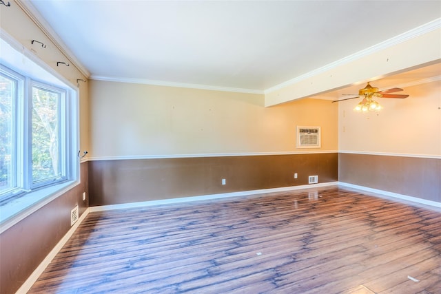 12 Rivera Ln, West Sayville, NY 11796 - unfurnished room with crown molding, wood finished floors, an AC wall unit, and a ceiling fan