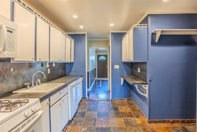 12 Rivera Ln, West Sayville, NY 11796 - kitchen with white appliances, backsplash, dark stone finish floors, crown molding, and recessed lighting