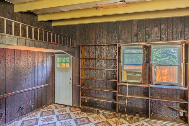 12 Rivera Ln, West Sayville, NY 11796 - miscellaneous room with wooden walls, cooling unit, beamed ceiling, and tile patterned floors