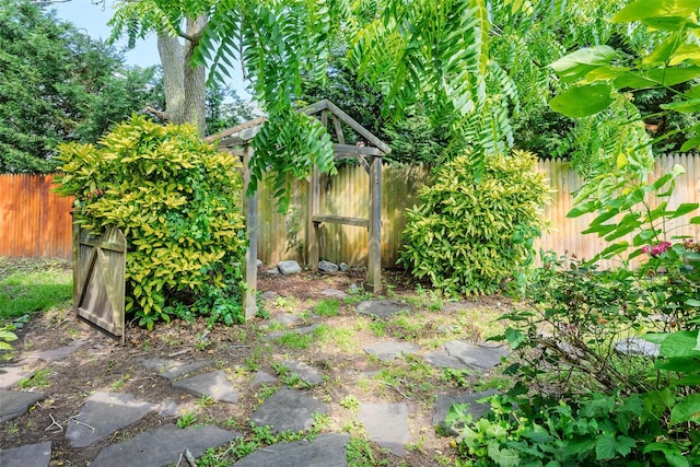 12 Rivera Ln, West Sayville, NY 11796 - fenced backyard with an outbuilding