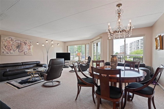 100 High Point Dr Unit 310, Hartsdale, NY 10530 - dining space featuring carpet and a chandelier
