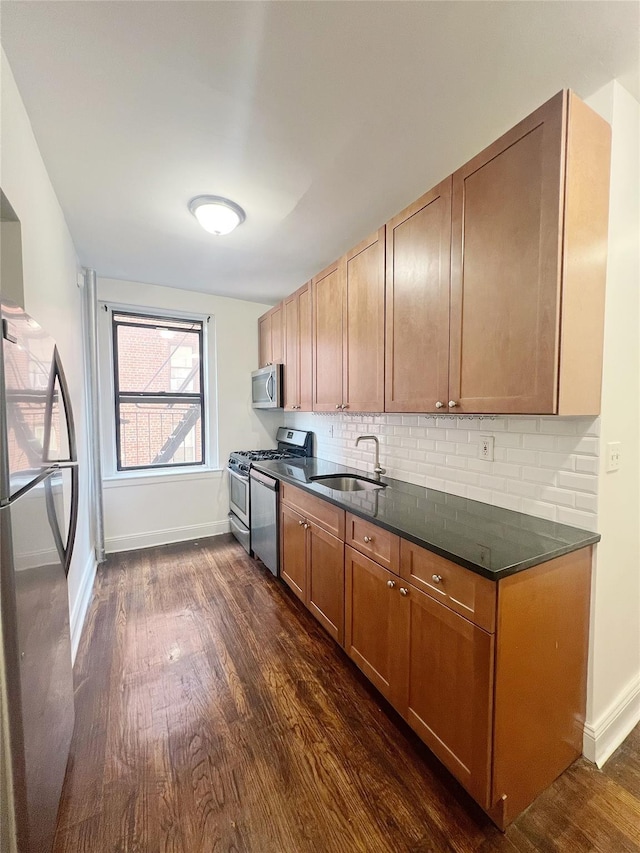 14809 Northern Blvd Unit 3N, Flushing, NY 11354 - kitchen with stainless steel appliances, dark wood finished floors, decorative backsplash, and brown cabinetry