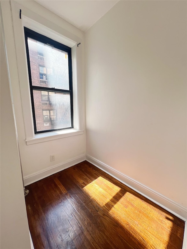 14809 Northern Blvd Unit 3N, Flushing, NY 11354 - unfurnished room with wood finished floors and baseboards