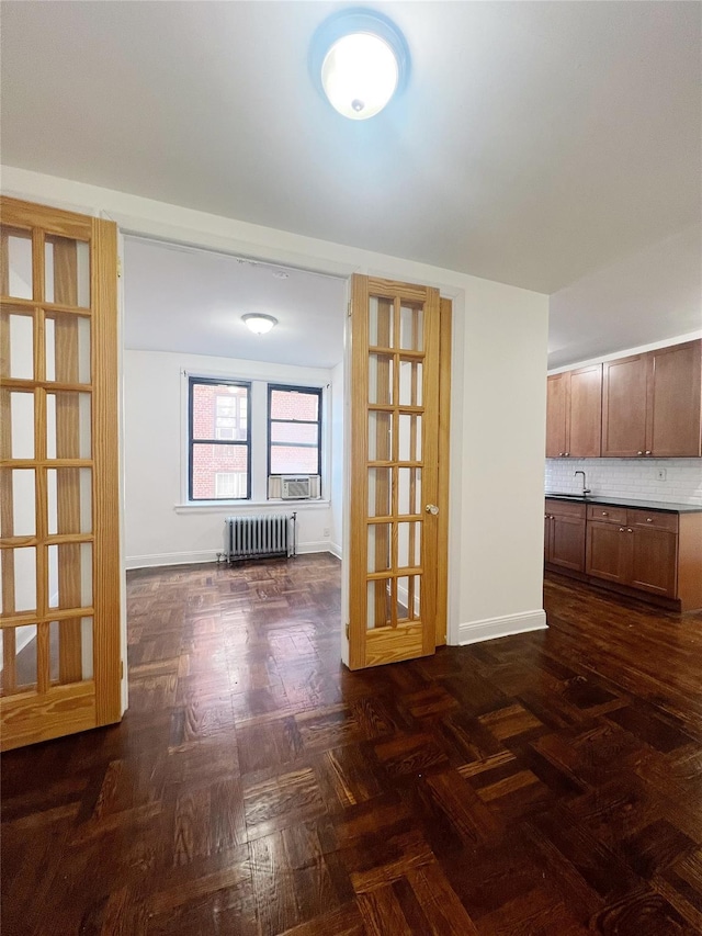 14809 Northern Blvd Unit 3N, Flushing, NY 11354 - unfurnished room with radiator heating unit and baseboards