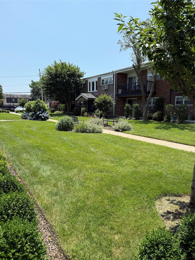 18 Ivy St Unit 1B, Farmingdale, NY 11735 - view of community featuring a yard