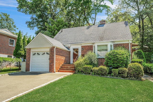 86 Briary Rd, Dobbs Ferry, NY 10522 - view of front of house featuring brick siding, a garage, asphalt driveway, a chimney, and a front yard