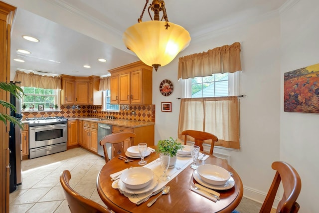 86 Briary Rd, Dobbs Ferry, NY 10522 - dining room with plenty of natural light, light tile patterned flooring, ornamental molding, and recessed lighting