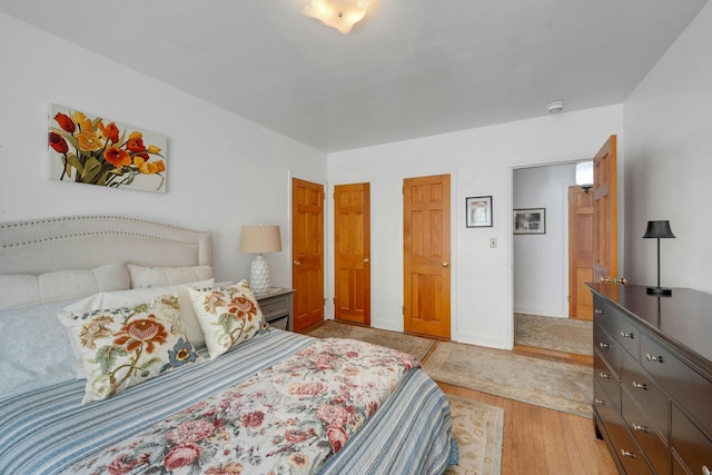 86 Briary Rd, Dobbs Ferry, NY 10522 - bedroom with light wood-style flooring and baseboards