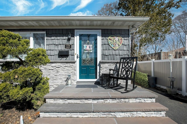 117 E Madison St, East Islip, NY 11730 - property entrance featuring stone siding
