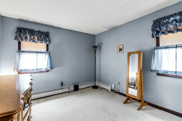 117 E Madison St, East Islip, NY 11730 - unfurnished bedroom featuring carpet and multiple windows