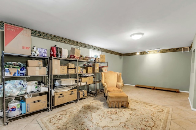 117 E Madison St, East Islip, NY 11730 - living area with tile patterned flooring