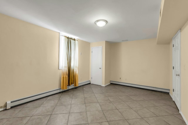 117 E Madison St, East Islip, NY 11730 - unfurnished room with baseboard heating and light tile patterned flooring