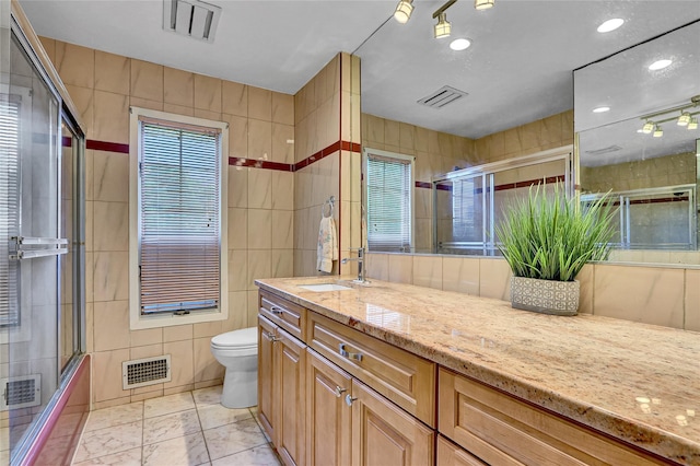 18 Pashen Pl, Dix Hills, NY 11746 - full bath featuring tile walls, vanity, and tiled shower / bath combo