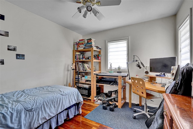 18 Pashen Pl, Dix Hills, NY 11746 - bedroom featuring wood finished floors, a desk, and a ceiling fan