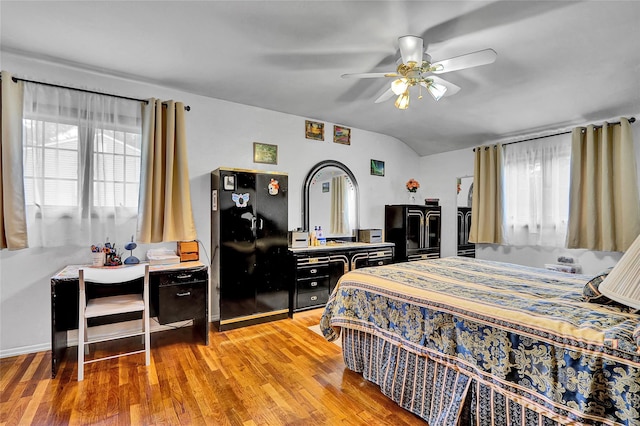 18 Pashen Pl, Dix Hills, NY 11746 - bedroom featuring vaulted ceiling, light wood-type flooring, multiple windows, ceiling fan, and freestanding refrigerator