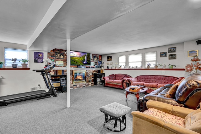 18 Pashen Pl, Dix Hills, NY 11746 - carpeted living room featuring a fireplace