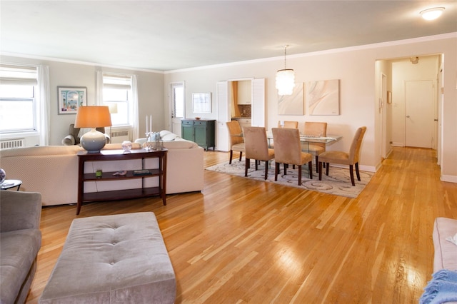 162-41 Powells Cove Blvd Unit 4K, Beechhurst, NY 11357 - living area featuring ornamental molding and light wood finished floors