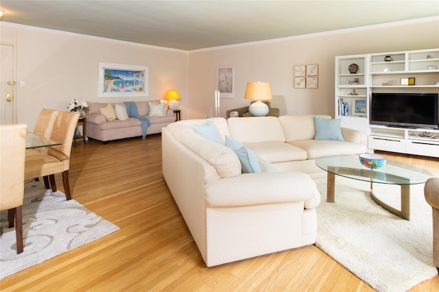 162-41 Powells Cove Blvd Unit 4K, Beechhurst, NY 11357 - living room featuring crown molding and wood finished floors