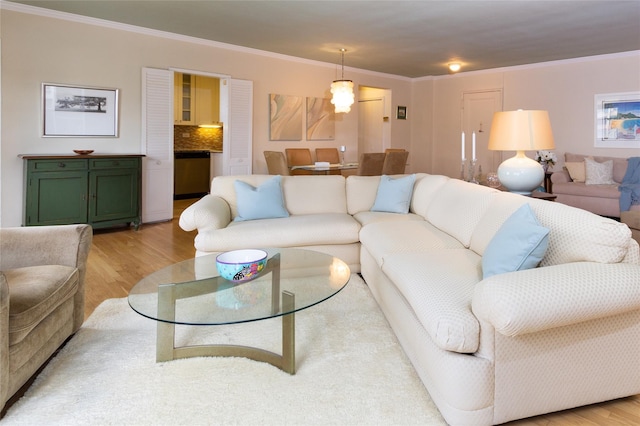 162-41 Powells Cove Blvd Unit 4K, Beechhurst, NY 11357 - living area with light wood-style floors and ornamental molding