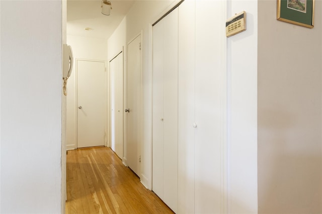 162-41 Powells Cove Blvd Unit 4K, Beechhurst, NY 11357 - corridor featuring light wood-style floors