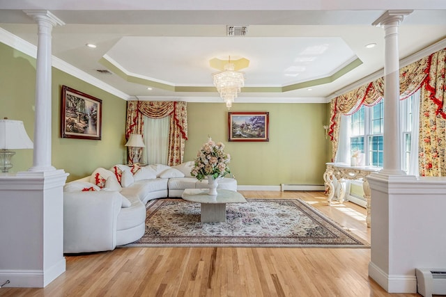 3 Kohlsaat Ct, Smithtown, NY 11787 - living area featuring a tray ceiling, ornate columns, crown molding, and recessed lighting