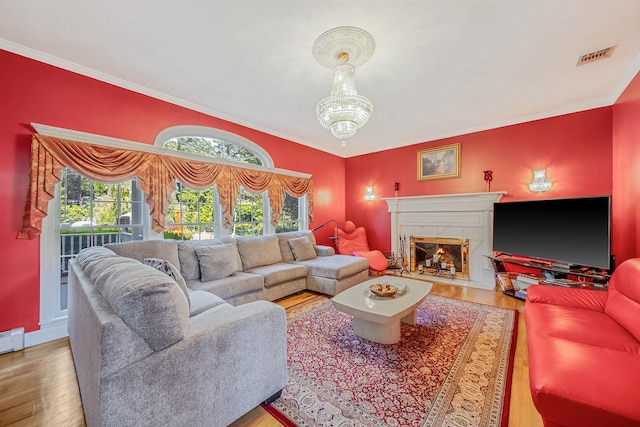 3 Kohlsaat Ct, Smithtown, NY 11787 - living area featuring wood finished floors, ornamental molding, and a high end fireplace