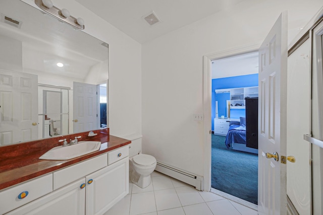 3 Kohlsaat Ct, Smithtown, NY 11787 - bathroom featuring a baseboard heating unit, vanity, tile patterned floors, and ensuite bathroom
