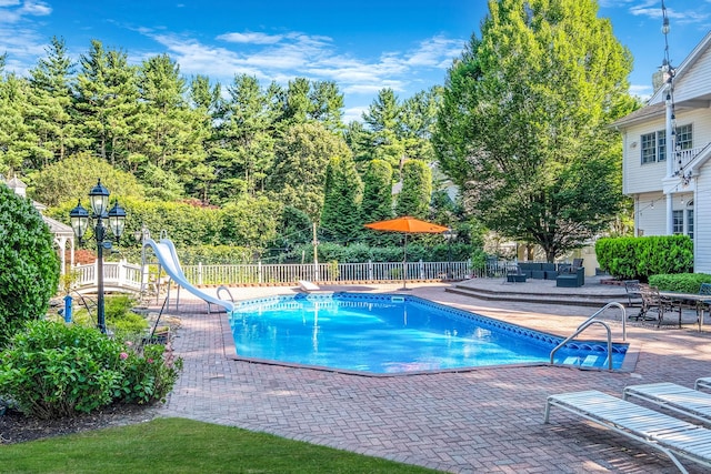 3 Kohlsaat Ct, Smithtown, NY 11787 - view of pool featuring a patio area, a water slide, and outdoor lounge area
