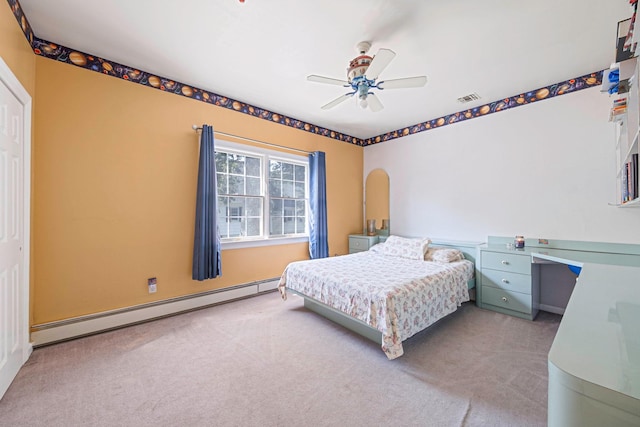 3 Kohlsaat Ct, Smithtown, NY 11787 - carpeted bedroom with a baseboard radiator and ceiling fan