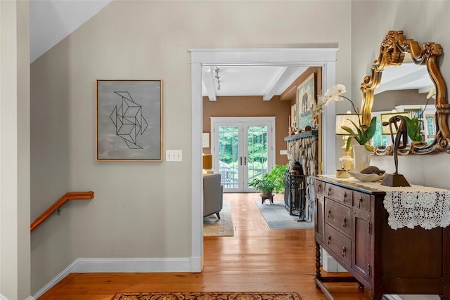 17 Half Moon Rdg, Cold Spring, NY 10516 - hall with light wood-style flooring, french doors, and beamed ceiling