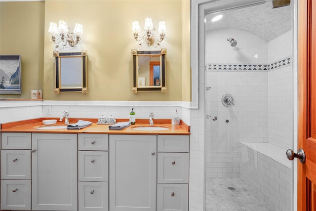 17 Half Moon Rdg, Cold Spring, NY 10516 - full bath with tiled shower, double vanity, wainscoting, and tile walls